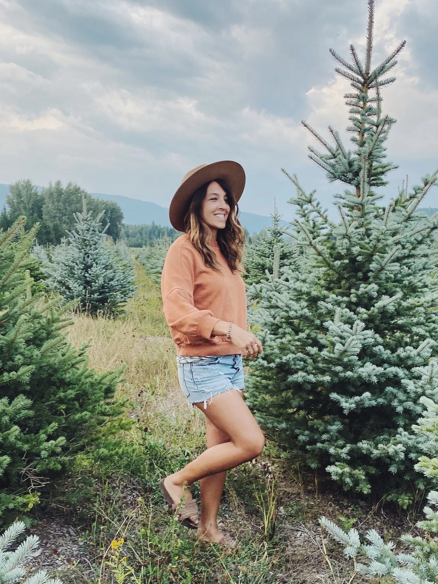Jenn Miller, Orange County birth doula, smiling outdoors